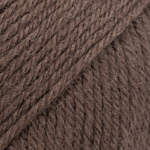 Image of DROPS Karisma yarn, a superwash-treated classic wool yarn. The yarn's smooth texture and rich colour make it perfect for a variety of knitting and crochet projects. Ideal for creating garments and accessories, this wool offers durability, softness, and easy care, making it a go-to choice for crafters