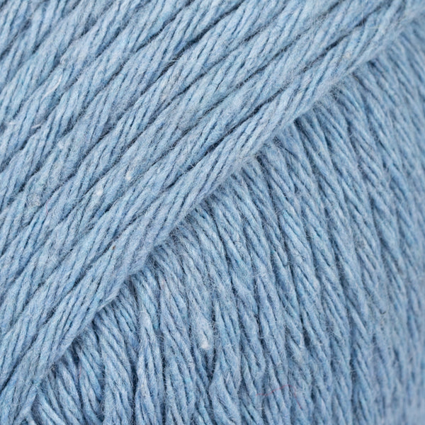 DROPS Paris 100% recycled cotton wool yarn in various denim shades, perfect for eco-friendly knitting and crochet projects