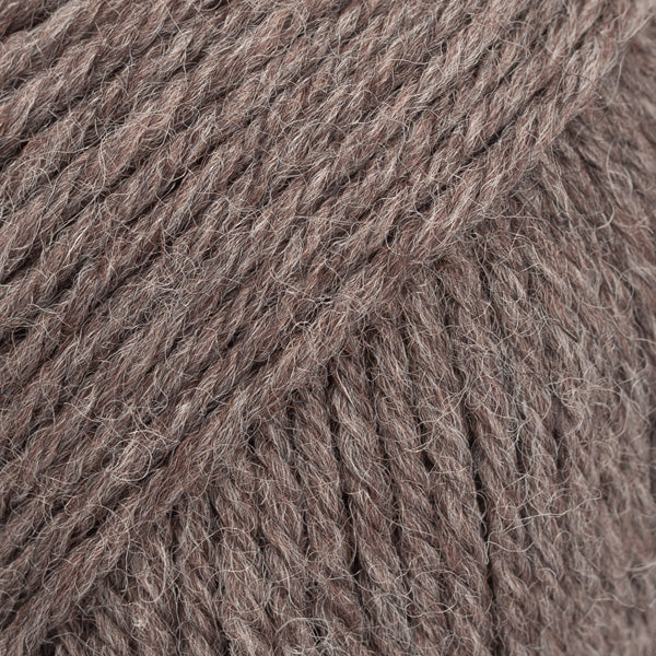 Image of DROPS Karisma yarn, a superwash-treated classic wool yarn. The yarn's smooth texture and rich colour make it perfect for a variety of knitting and crochet projects. Ideal for creating garments and accessories, this wool offers durability, softness, and easy care, making it a go-to choice for crafters