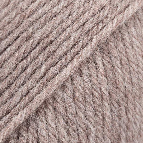 Image of DROPS Karisma yarn, a superwash-treated classic wool yarn. The yarn's smooth texture and rich colour make it perfect for a variety of knitting and crochet projects. Ideal for creating garments and accessories, this wool offers durability, softness, and easy care, making it a go-to choice for crafters