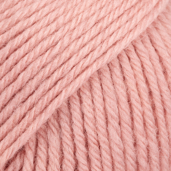 Image of DROPS Karisma yarn, a superwash-treated classic wool yarn. The yarn's smooth texture and rich colour make it perfect for a variety of knitting and crochet projects. Ideal for creating garments and accessories, this wool offers durability, softness, and easy care, making it a go-to choice for crafters