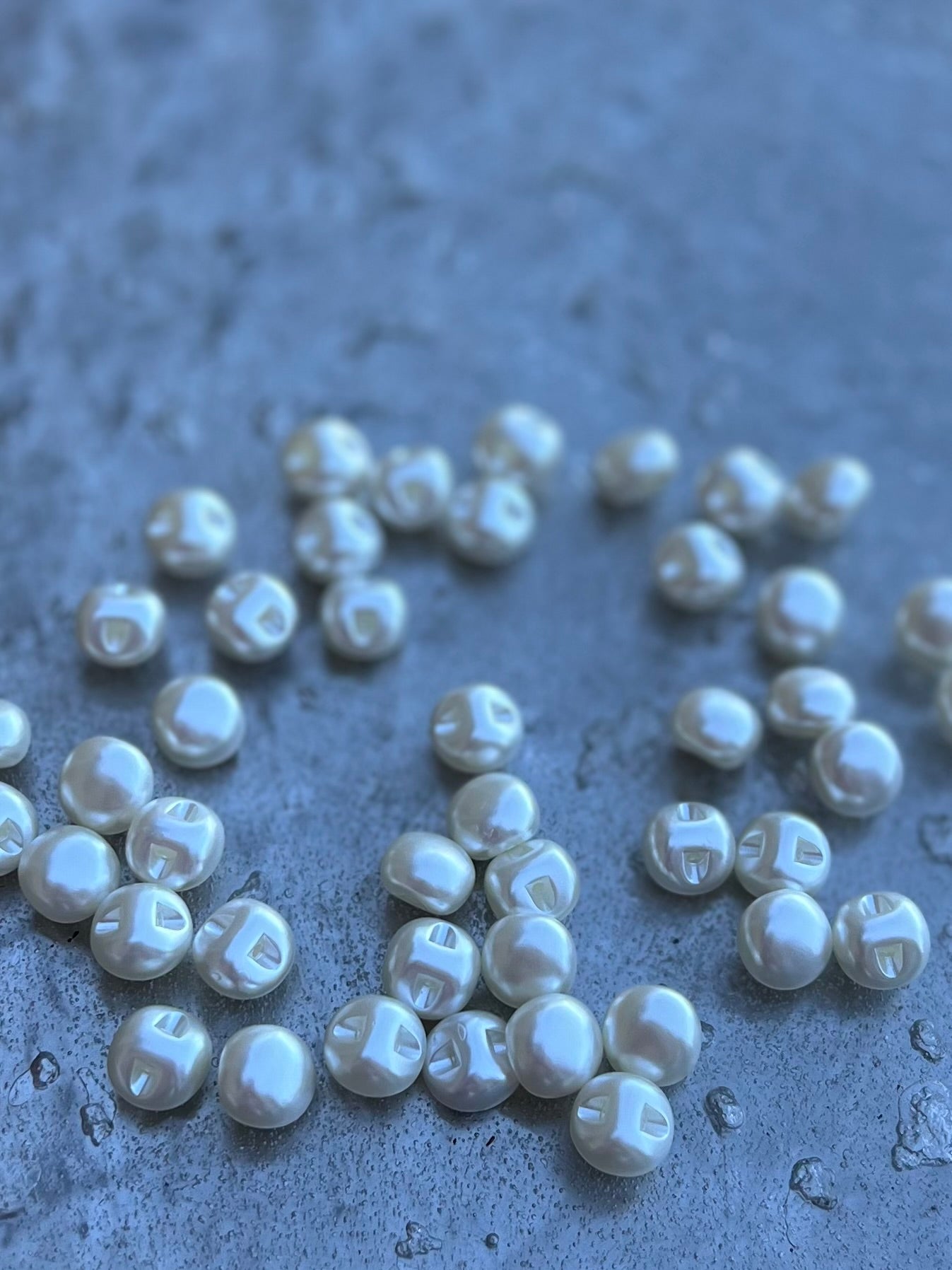 Perfect for blouses, dresses, cardigans, and craft projects, our pearl button adds a classic, refined detail to any garment. Its lightweight yet sturdy construction ensures both style and durability.