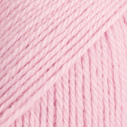 Close-up image of a soft yarn skein made from 65% wool and 35% alpaca wool, showcasing its smooth, luxurious texture. The yarn is a light, airy fiber perfect for knitting and crochet projects, with a rich sheen highlighting the natural beauty of alpaca wool. Ideal for creating warm, lightweight garments