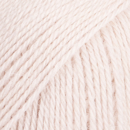 Close-up image of a soft yarn skein made from 65% wool and 35% alpaca wool, showcasing its smooth, luxurious texture. The yarn is a light, airy fiber perfect for knitting and crochet projects, with a rich sheen highlighting the natural beauty of alpaca wool. Ideal for creating warm, lightweight garments