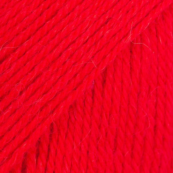 Close-up image of a soft yarn skein made from 65% wool and 35% alpaca wool, showcasing its smooth, luxurious texture. The yarn is a light, airy fiber perfect for knitting and crochet projects, with a rich sheen highlighting the natural beauty of alpaca wool. Ideal for creating warm, lightweight garments