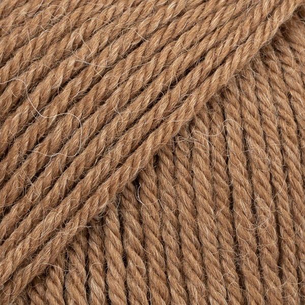 DROPS Lima is a high-quality DK wool blend, combining wool and alpaca for warmth, softness, and durability.
