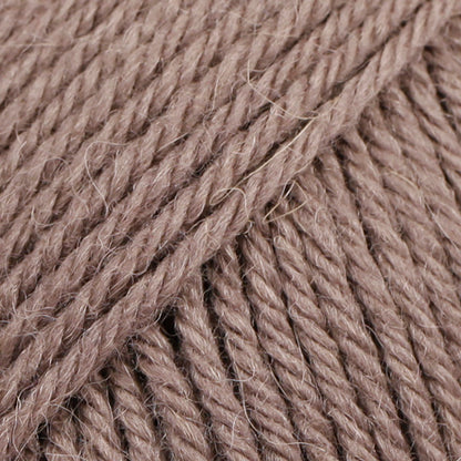 DROPS Lima is a high-quality DK wool blend, combining wool and alpaca for warmth, softness, and durability.
