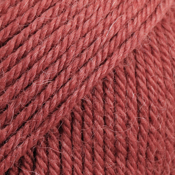DROPS Lima is a high-quality DK wool blend, combining wool and alpaca for warmth, softness, and durability.
