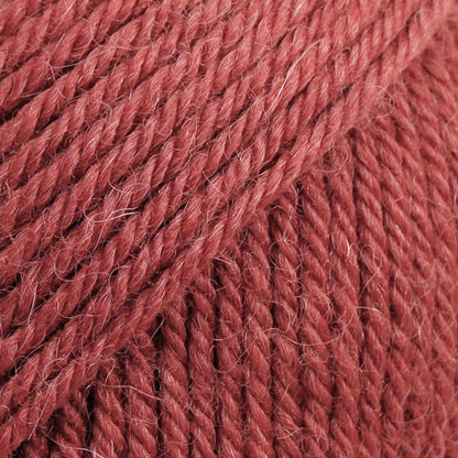 DROPS Lima is a high-quality DK wool blend, combining wool and alpaca for warmth, softness, and durability.