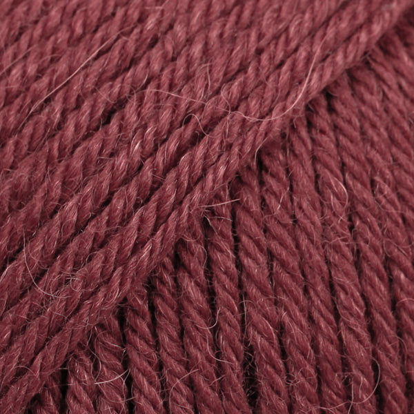 DROPS Lima is a high-quality DK wool blend, combining wool and alpaca for warmth, softness, and durability.