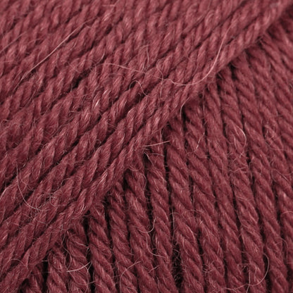 DROPS Lima is a high-quality DK wool blend, combining wool and alpaca for warmth, softness, and durability.