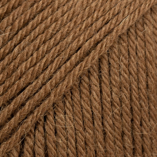 DROPS Lima is a high-quality DK wool blend, combining wool and alpaca for warmth, softness, and durability.