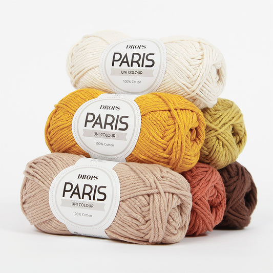 A selection of DROPS Paris cotton wool yarn in multiple colors, ideal for making soft and durable garments and accessories